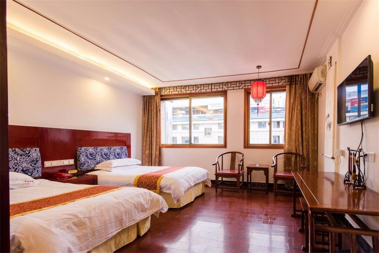 Jinyao Business Hotel Иу Стая снимка