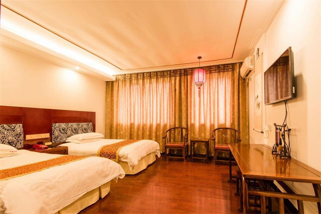 Jinyao Business Hotel Иу Стая снимка