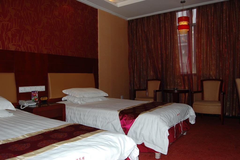 Jinyao Business Hotel Иу Стая снимка