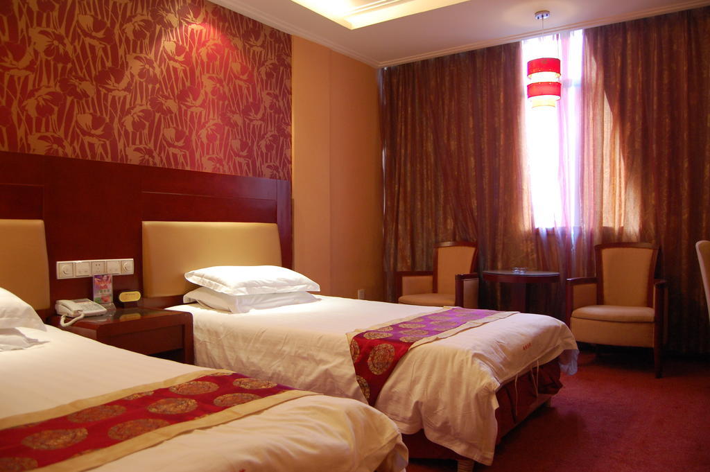 Jinyao Business Hotel Иу Стая снимка